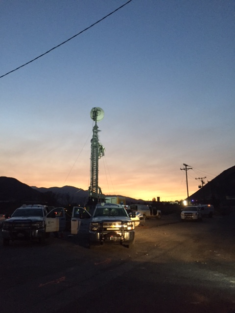 vehicles setting up satellite